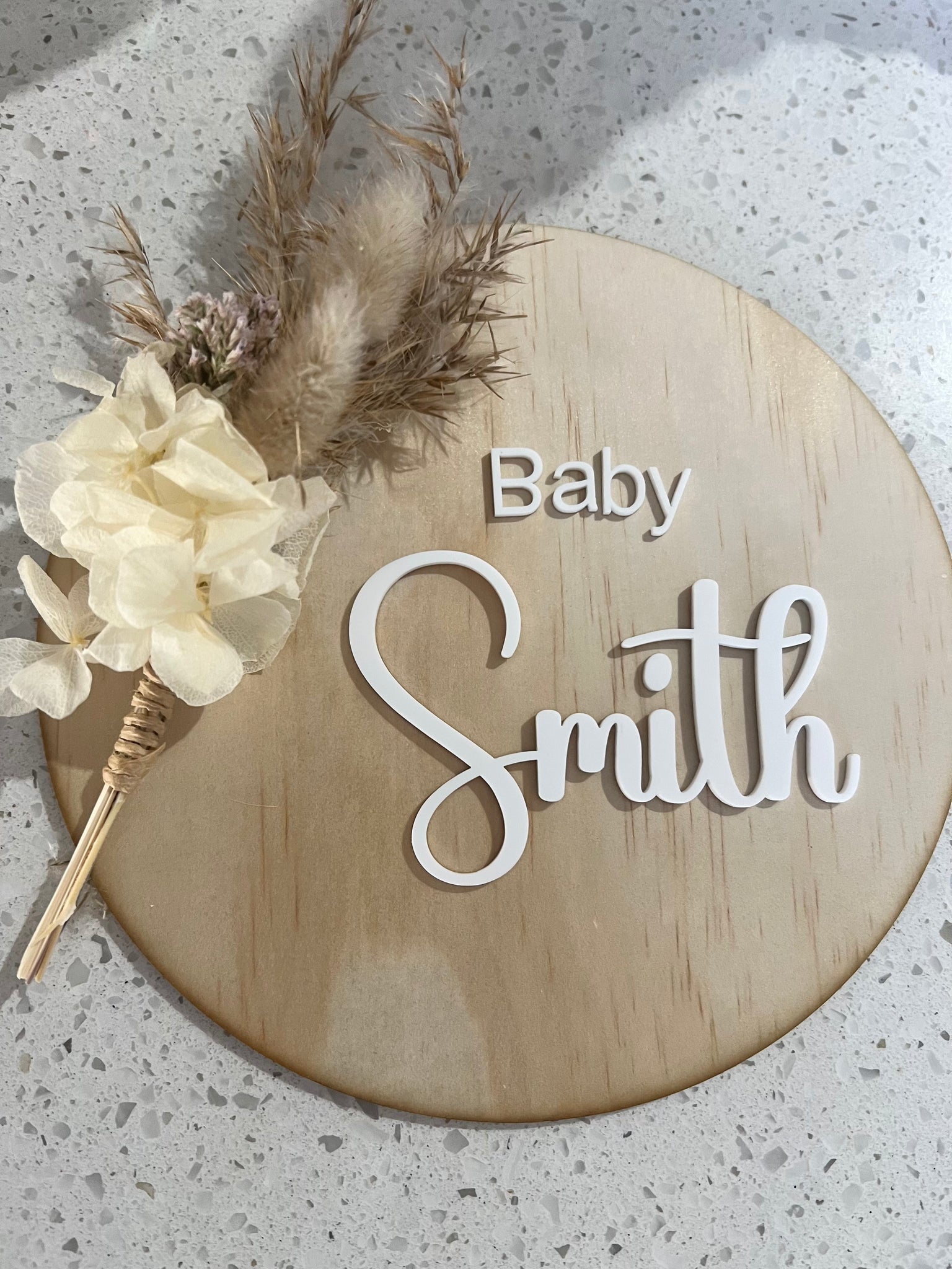 Baby announcement plaque with floral